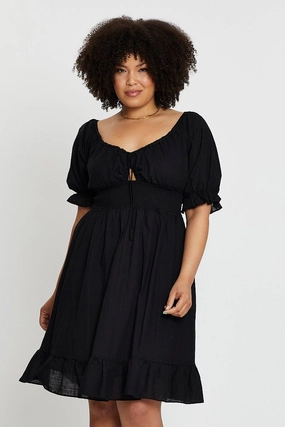 Black Short Puff Sleeve Peephole Green Skater Dress Sleek Cut