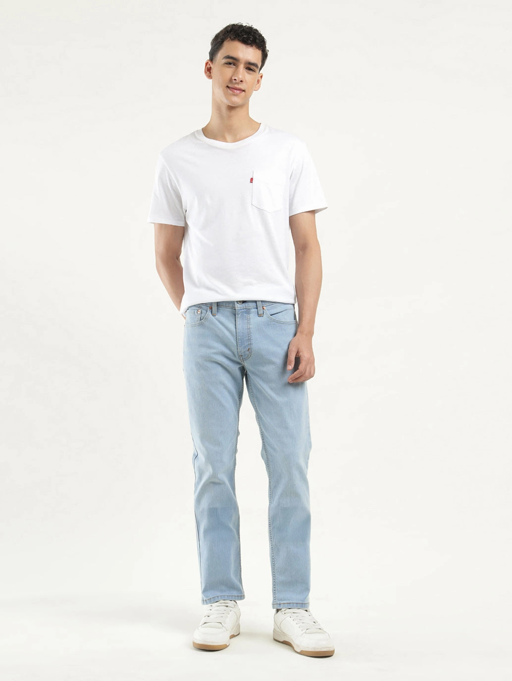 Men's 511 Indigo Slim Fit Mid Rise Jeans Elegant Travel Outfit Minimalist Style Distressed Details